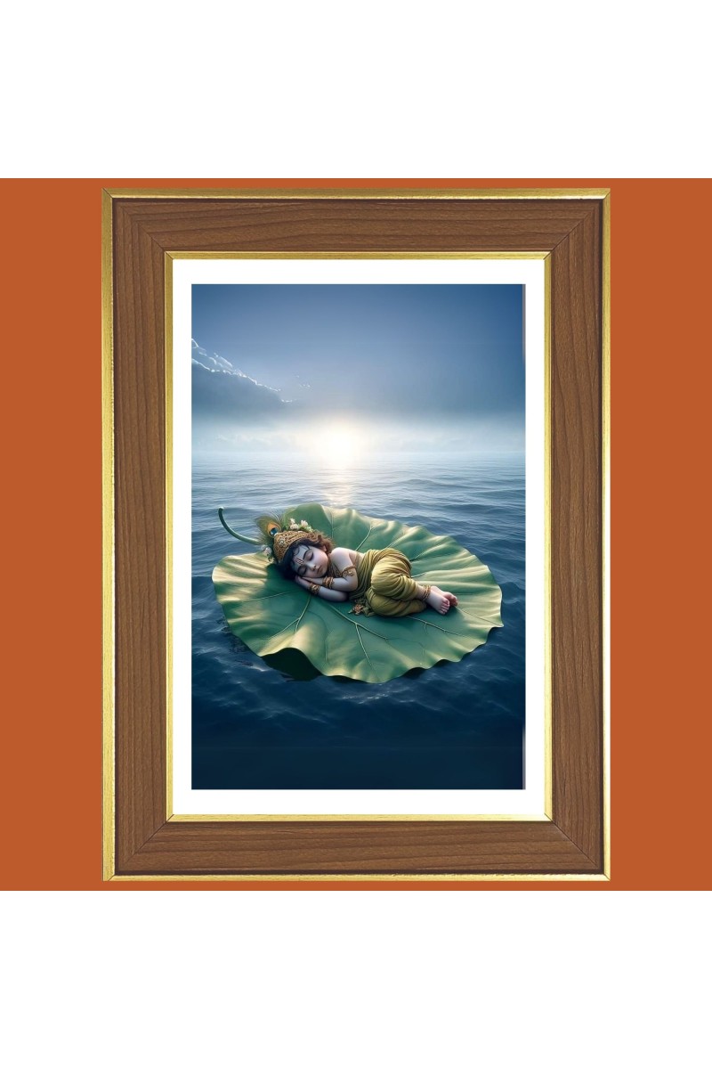 Baby Krishna Sleeping on a Leaf Photo Frame  10x14 Inches-Brown Wooden Frame for Home , Office & Temple Decoration and Gifting